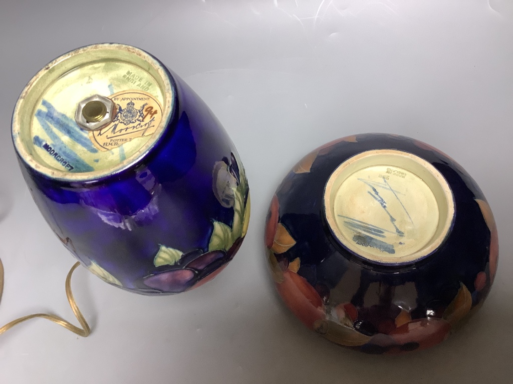 A small Moorcroft wisteria pattern table lamp base, height 16.5cm not including light fitting, and a Moorcroft Pomegranate pattern bowl